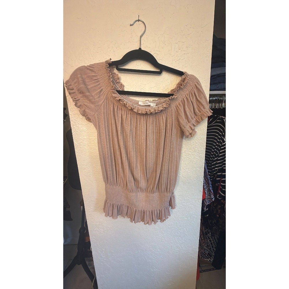 Blush short sleeved smocked blouse